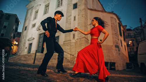 Photos Beautiful Couple Dancing a Latin Dance on the Quiet Street of an Old Town in a City