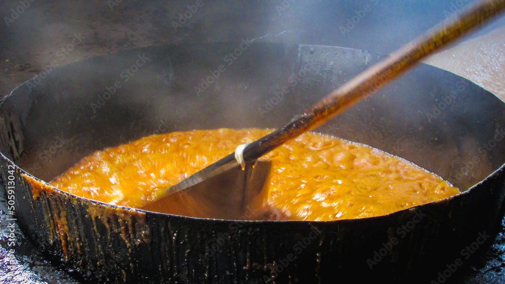 Αυτοκόλλητο large tacho of boiling molasses the main ingredient of the rapadura, the molasse