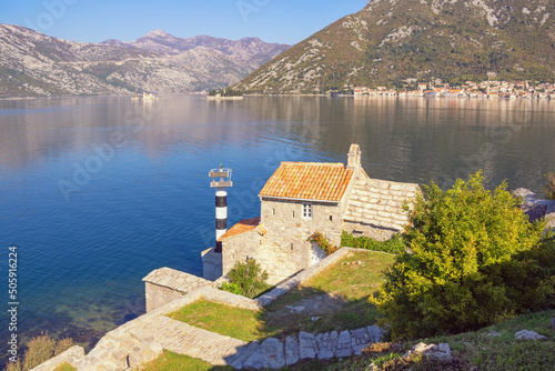 Beautiful autumn Mediterranean landscape. Montenegro. View of Kotor Bay, two small islands and ancient Church of Our Lady of Angels