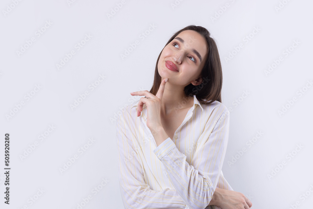 Portrait of a beautiful young woman thinking, isolated on white background Portrait of a beautiful young woman thinking, isolated on white background