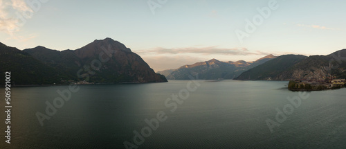 Aerial view of Lake Iseo and mountains background ,panorama of the lake at sunrise,Bergamo Italy.