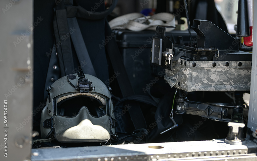 Φωτογραφία Detail view from inside a United States Airforce helicopter with view of the pilot helmet and cockpit