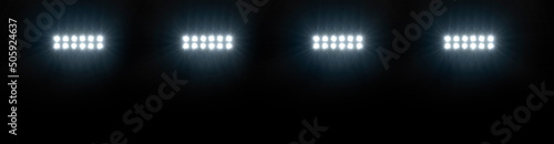 Horizontal wide view of stadium lights at night
