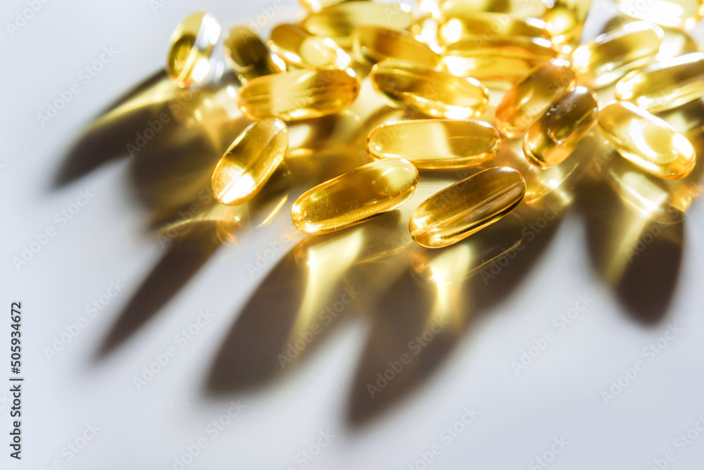 Composition with selective focus of omega 3 capsules close up. Composition with selective focus of omega 3 capsules close up.