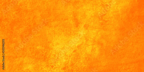 Abstract yellow or orange stucco wall texture, Painted scratched orange grunge texture, colorful bright yellow or orange background in distressed vintage textured design.