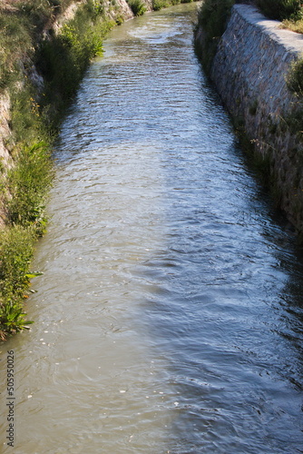 Course of the Aljufia irrigation channel that irrigates the Murcian orchard with abundant water	
 photo