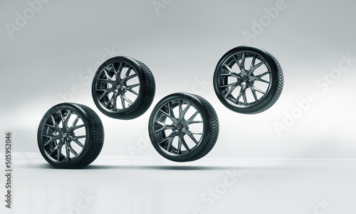 3d render of rubber tires on cast steel rims. Wheel sale concept. Auto repair shops.