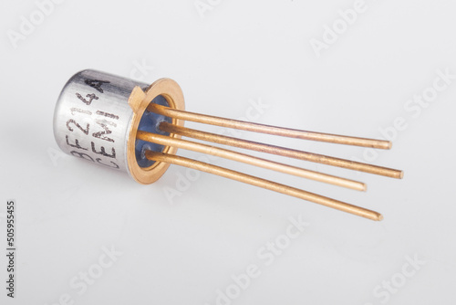 Wallpaper Mural Old transistor in metal case on white background. Electronic component. Silicon device. Torontodigital.ca