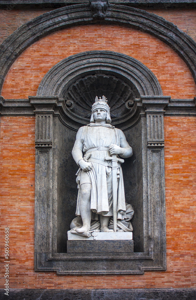 Statue King Friedrich II on the facade of Palazzo Reale di Napoli in Piazza del Plebiscito in Naples
