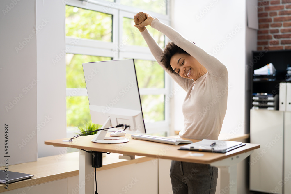 Photography Worker Stretch Exercise At Stand Desk