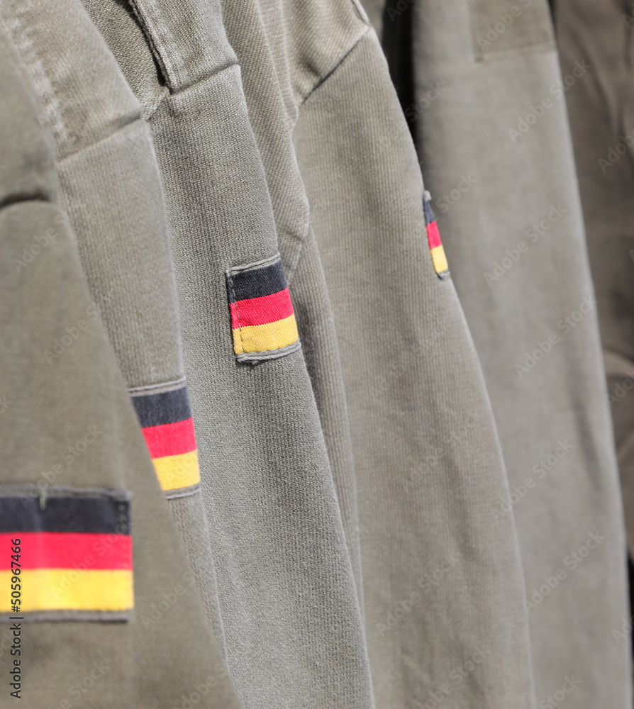 Φωτογραφία military green jacket with the flag of the German in the sleeve of the suit