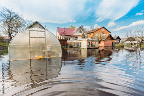 Photo Vegetable Garden Beds In Water During Spring Flood floodwaters during natural disaster