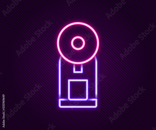 Glowing neon line Smart coffee machine system icon isolated on black background. Internet of things concept with wireless connection. Colorful outline concept. Vector