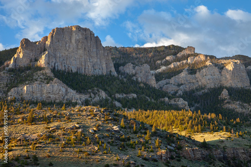 Cliffs in the Absaroka Mountains near Cody Wyoming in early morning light photo