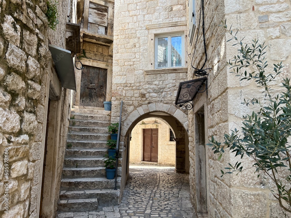 Alleyway in the old town of Trogir, Croatia