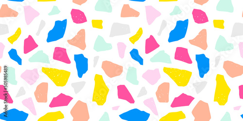 Colorful terrazzo flooring seamless pattern with bright marble rocks. Children style material background of mosaic stone. Trendy fashion print wallpaper for textile project or web backdrop.