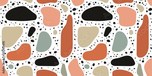 Abstract organic flat terrazzo shapes seamless pattern. Trendy colorful stone shape background design. Terrazo rock decoration wallpaper, artistic minimalist design.