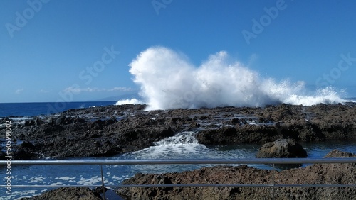 Sea wave crashing on the rock
