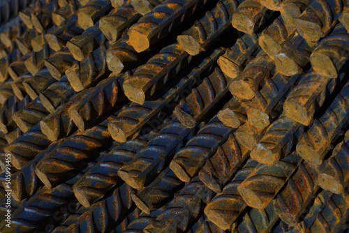 metal reinforced concrete bars rusty rods stack close-up construction material