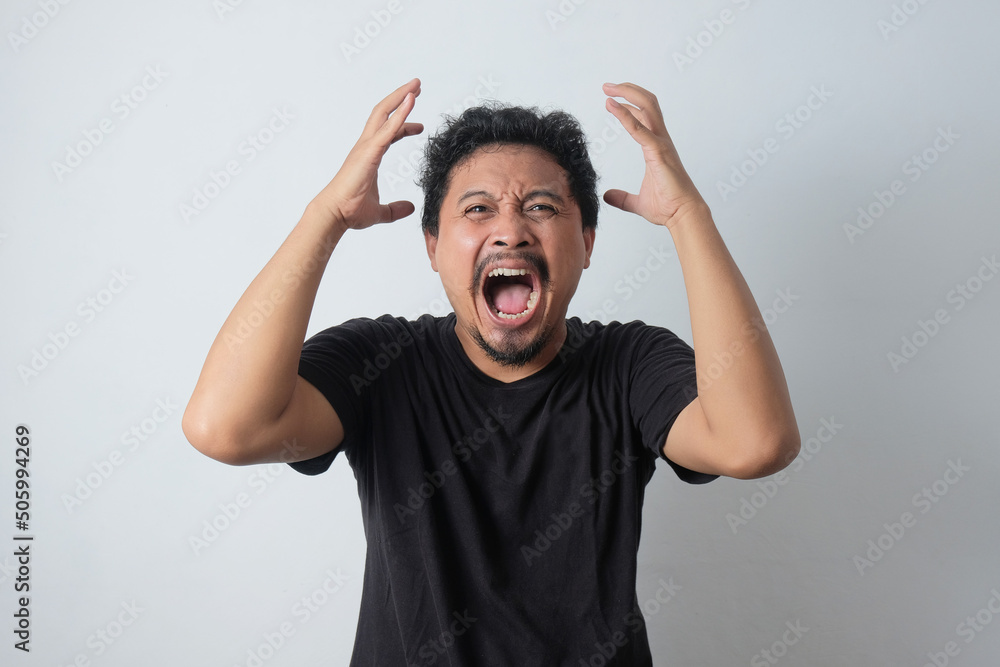 portrait of frustrated young asian guy portrait of frustrated young asian guy