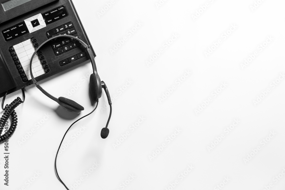 Headset and customer support equipment at call center ready for actively service , Communication support, call center and customer service help desk.for (call center) concept . Headset and customer support equipment at call center ready for actively service , Communication support, call center and customer service help desk.for (call center) concept .