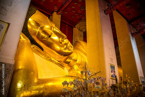 Wat Phra Non Chak Si Worawihan or Wat Phra Non Chakkrasi Worawihan, big reclined Buddha, in Sing buri, Thailand