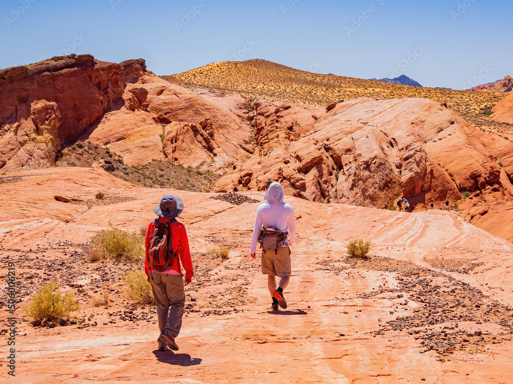 Naklejka premium People hiking in the Valley of Fire State Park