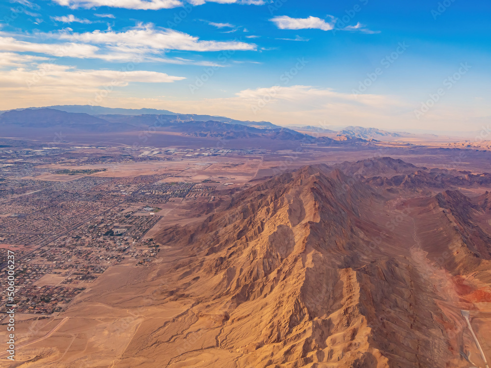 Sunset aerial view of the Frenchman Mountain and cityscape of Las Vegas