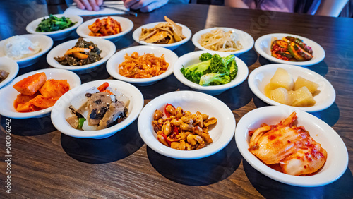 Fototapeta Naklejka Na Ścianę i Meble -  Close up shot of many Korean style appetizer