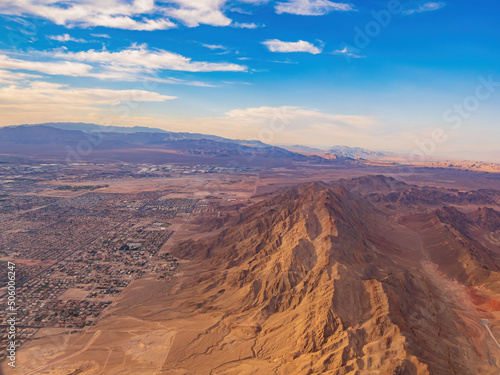 Photography Sunset aerial view of the Frenchman Mountain and cityscape of Las Vegas