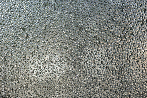 Cuadro en lienzo Wet glass texture, sweaty window. Abstract background, wallpaper.