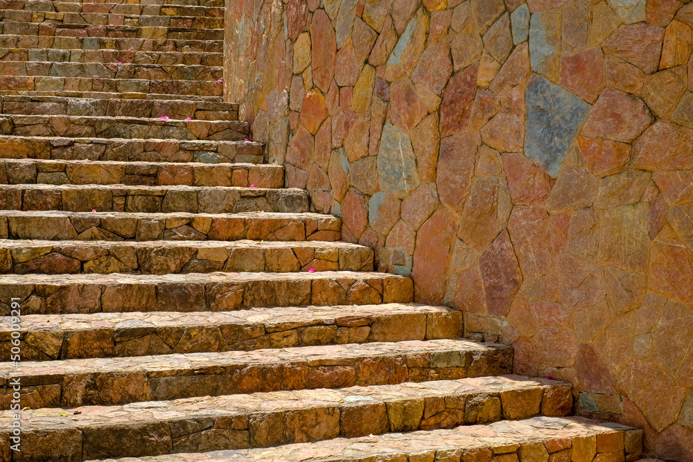 Close up ancient stone ladder or ancient stairway use for web design and wallpaper background Close up ancient stone ladder or ancient stairway use for web design and wallpaper background