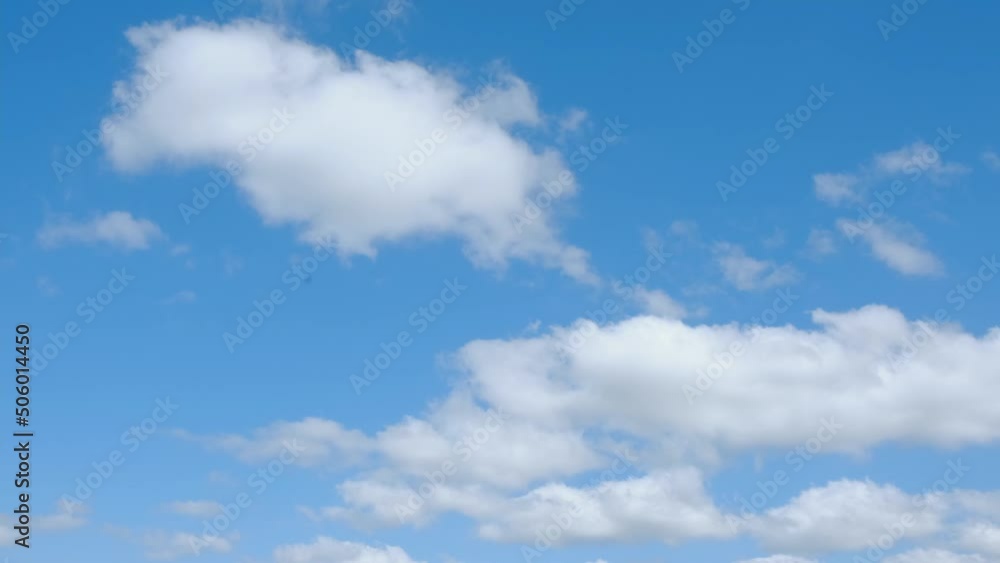 Blue sky white clouds. White clouds background. Puffy fluffy white clouds. Blue sky white clouds. White clouds background. Puffy fluffy white clouds.