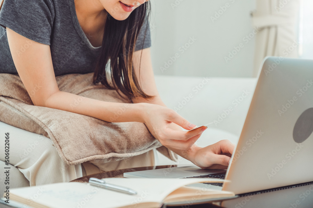 Woman using calculator Accounting Calculating Cost Economic bills saving money in home , finance Woman using calculator Accounting Calculating Cost Economic bills saving money in home , finance