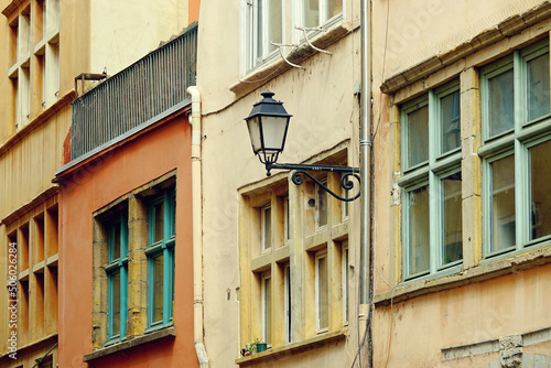 Old colorful buildings and lantern in Vieux Lyon, historical district of Lyon, Avergne-Rhône-Alpes, France