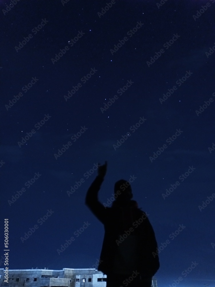 silhouette of a person in the night
