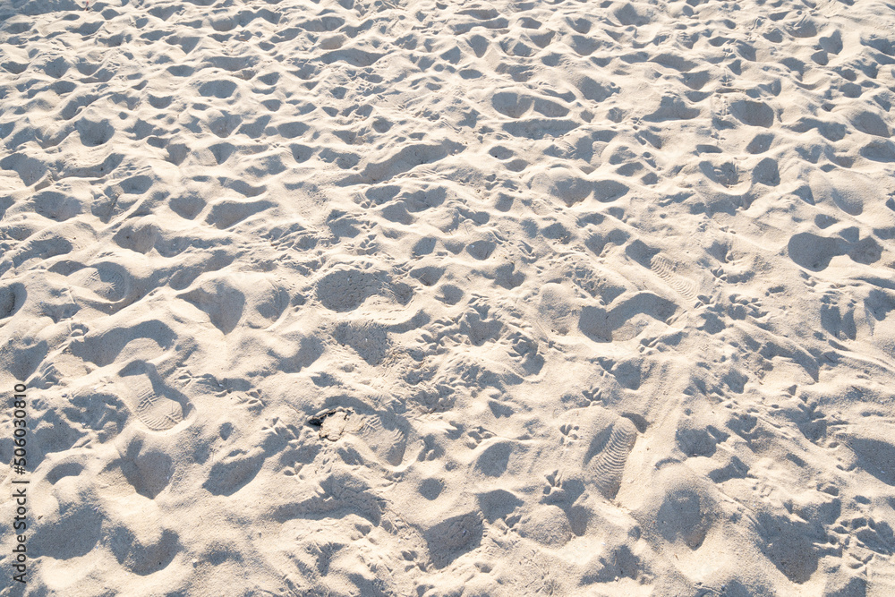 Detail of texture sand in tropical island Summer background and travel design High Quality Detail Of Curve sand texture.Footprints on sand beach Detail of texture sand in tropical island Summer background and travel design High Quality Detail Of Curve sand texture.Footprints on sand beach