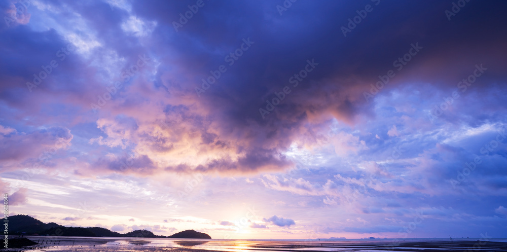Sunset or sunrise sky clouds over sea sunlight in Phuket Thailand Amazing nature landscape seascape