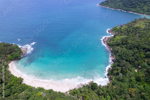 Aerial view Top down seashore wave crashing on seashore Beautiful turquoise sea surface in sunny day Good weather day summer background Amazing seascape top view
