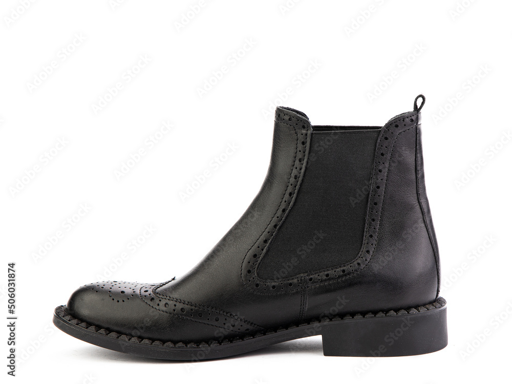 Women's autumn chelses black leather boots isolated white background. Left side view. Fashion shoes. Photoshoot for shoe shop concept. Women's autumn chelses black leather boots isolated white background. Left side view. Fashion shoes. Photoshoot for shoe shop concept.