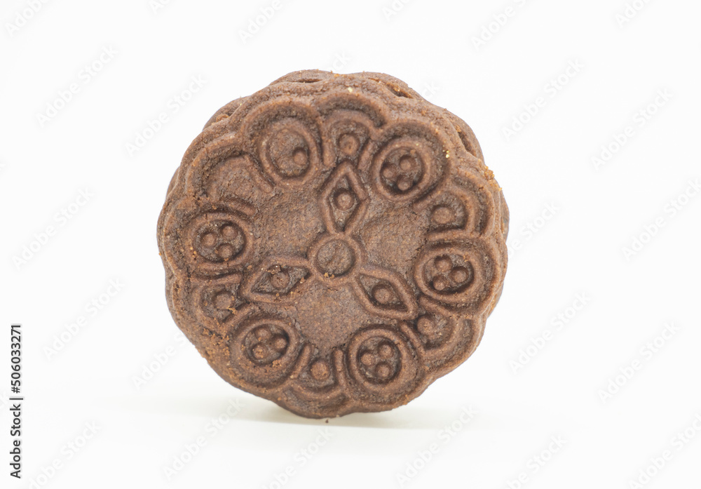 single biscuit over on white background, close up single biscuit over on white background, close up
