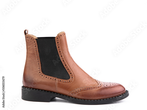 Women's autumn chelses brown leather boots isolated white background. right side view. Fashion shoes. Photoshoot for shoe shop concept.