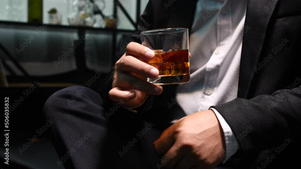 Businessmen in suits drinking Celebrate whiskey Businessmen in suits drinking Celebrate whiskey
