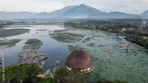 Aerial view of Situ Bagendit is a famous tourist spot in Garut with mountain view.  photo