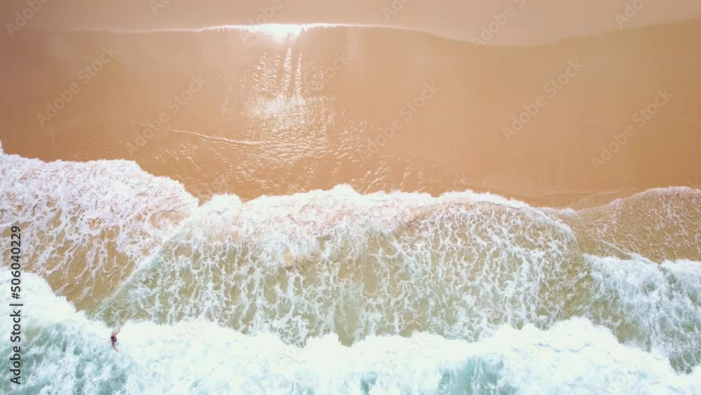 Top View of the sea surface Waves crashing Foaming and Splashing in the Ocean. Sunny Day summer background High quality footage. Phuket sea Thailand Top View of the sea surface Waves crashing Foaming and Splashing in the Ocean. Sunny Day summer background High quality footage. Phuket sea Thailand