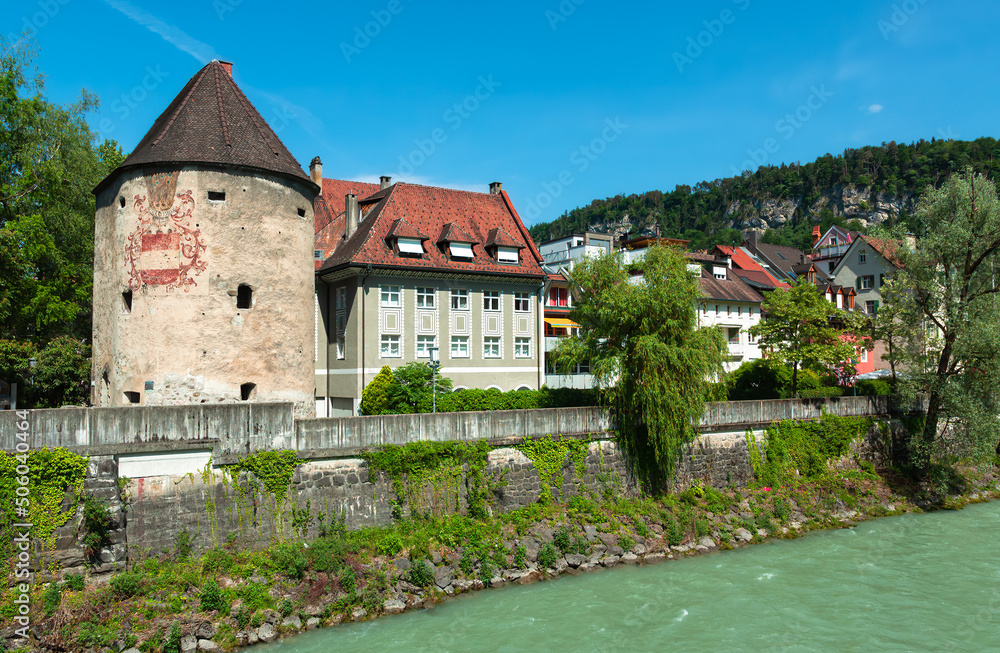 Feldkirch, Austria - May 20, 2022: View of the old town of Feldkirch with the water tower on the banks of the river Ill