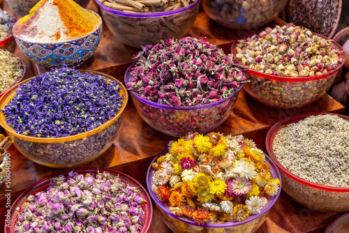Variety of Arabic spices and dried flowers in the traditional market in Dubai