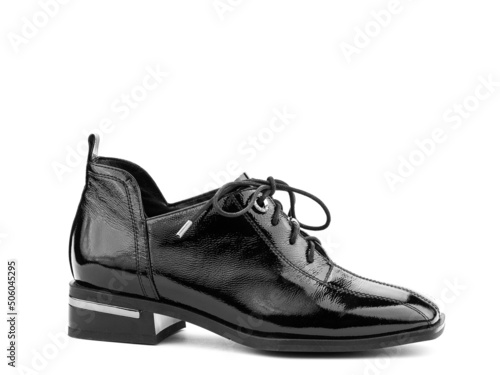 Women's autumn leather jodhpur boots with laces and average heels, isolated white background. Right side view. Fashion shoes. Photoshoot for shoe shop
