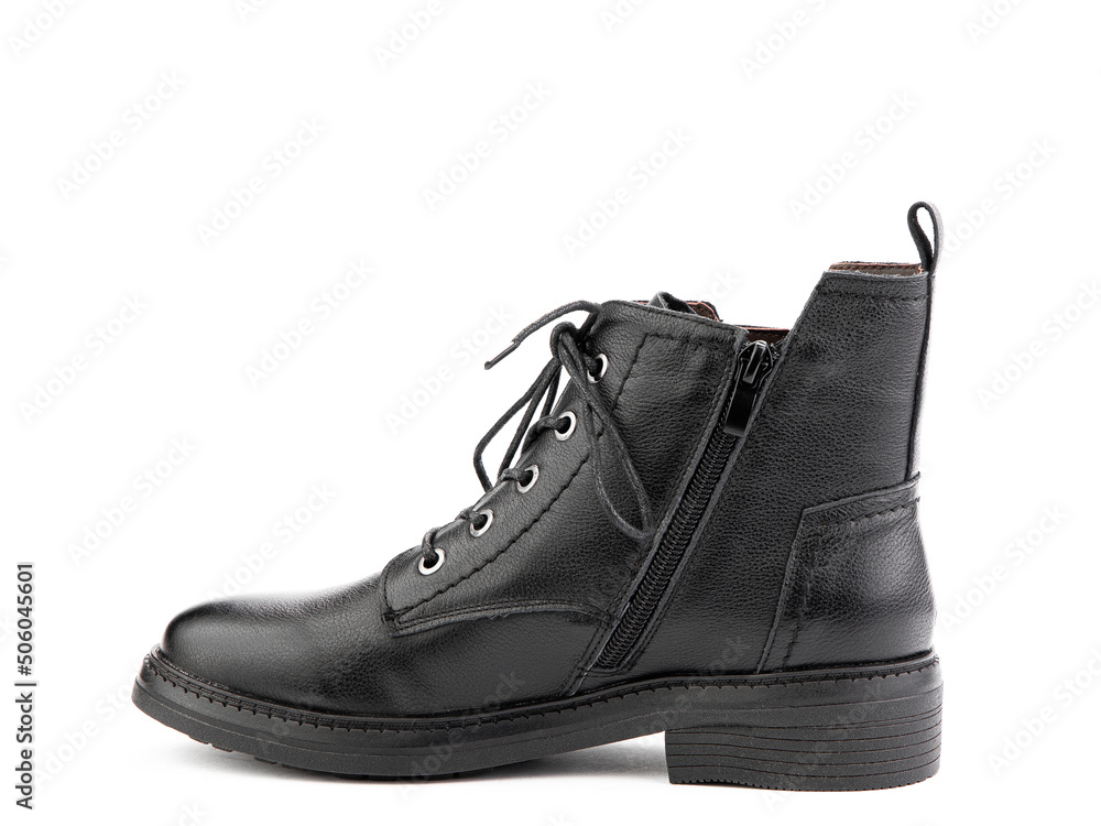 Women's autumn black leather jodhpur boots with laces and average heels, isolated white background. Left side view. Fashion shoes.