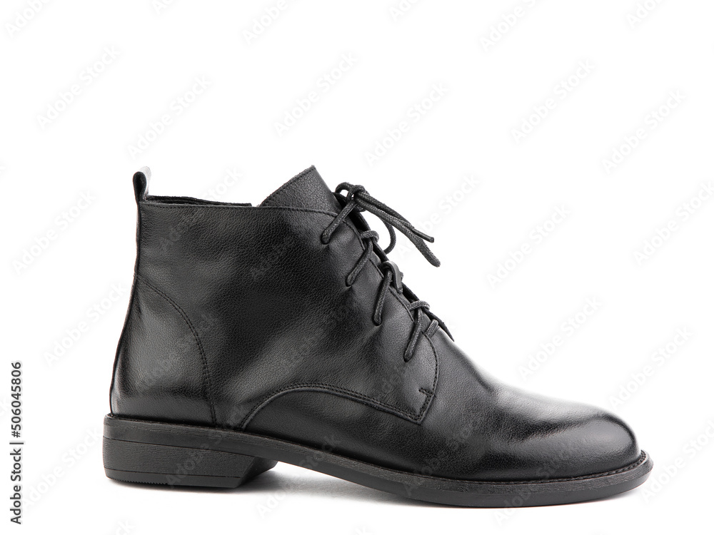 Women's autumn black leather jodhpur boots with laces and average heels, isolated white background. Right side view. Fashion shoes.